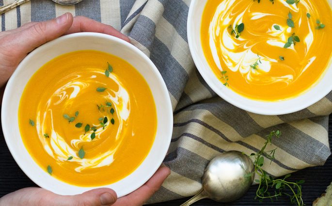 This easy and scrumptious Roasted Butternut Squash Soup with Thyme & Goat Cheese is a family favorite for crisp fall nights or the Thanksgiving holiday. Get the recipe at www.designsofanykind.com