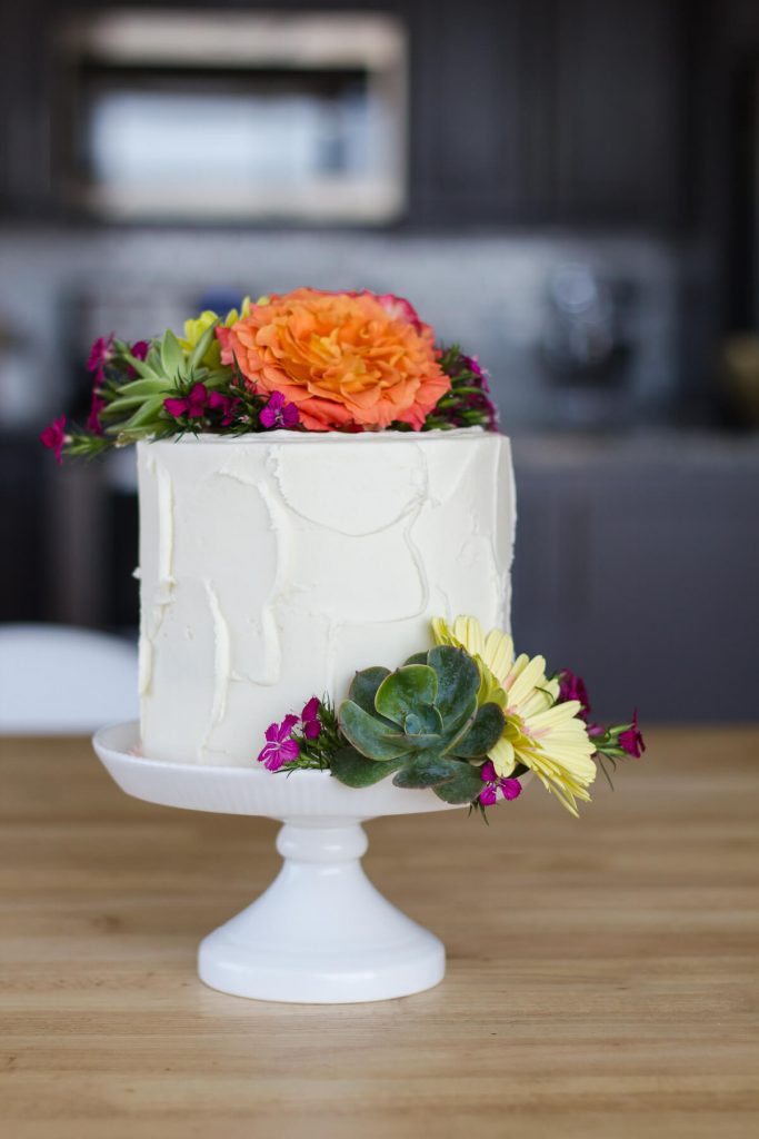 End your Cinco de Mayo on a sweet note with this decadent Mexican Chocolate Cake layered with spicy chocolate ganache and dulce de leche. Recipe at www.designsofanykind.com
